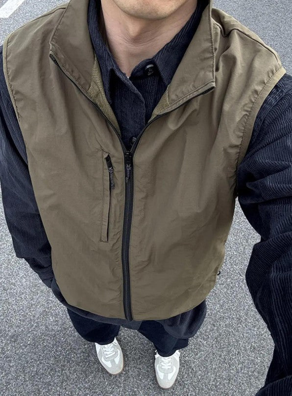 Olive-green Shirt Layered With A Trendy Brand Vest Jacket