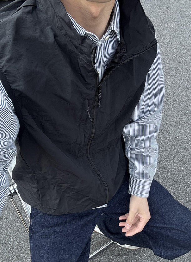 Olive-green Shirt Layered With A Trendy Brand Vest Jacket